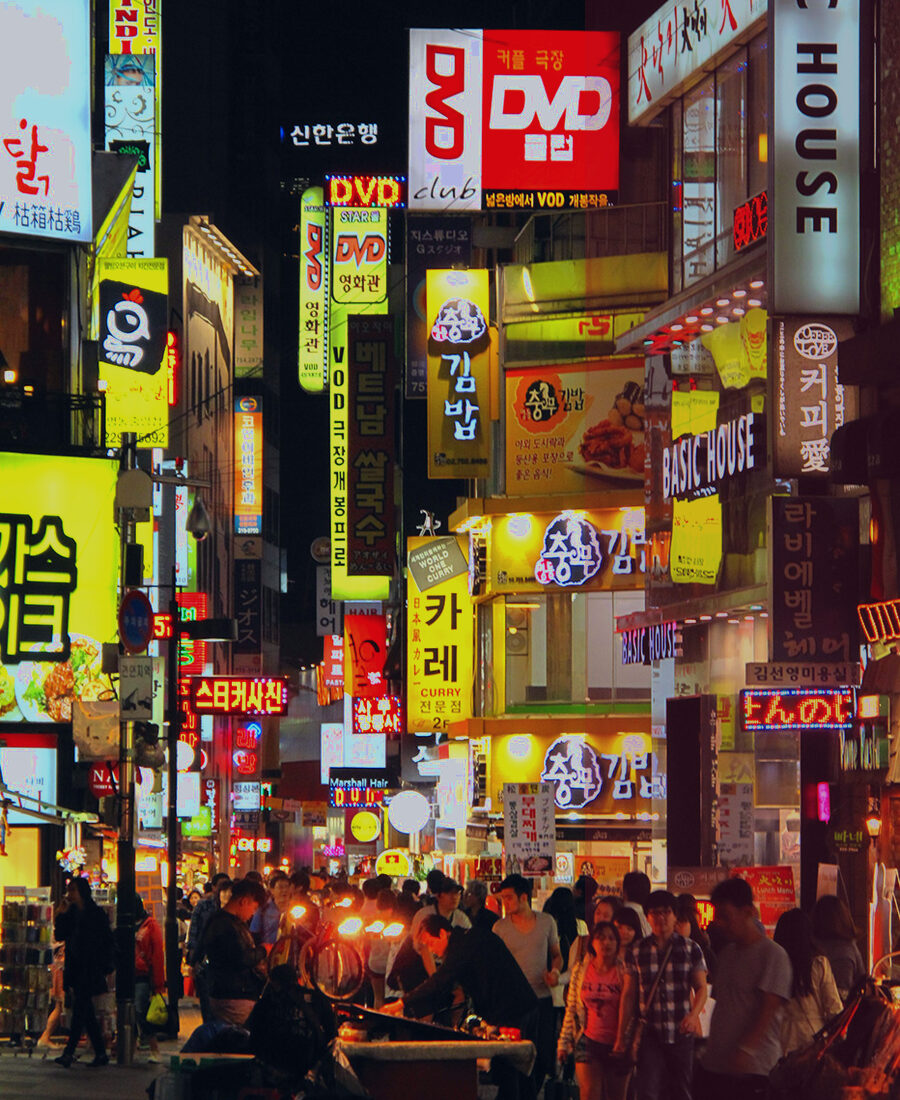 Neon city street at night.
